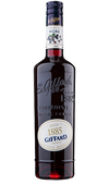 Bottle of Giffard Creme de Mure 750 ML with fresh blackberries and a cocktail glass