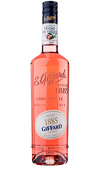 Bottle of Giffard Creme de Peche de Vigne 750 ML with ripe vine peaches and a cocktail glass