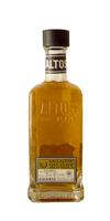 Bottle of Chateau Dumas Cenote Reposado Tequila 750 ML with agave and cocktail glass