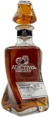 Adictivo Tequila Casks Whiskey 750 ML bottle with dark amber color.