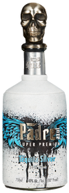 Padre Azul Silver tequila bottle with silver skull cap and blue wing design on white glass