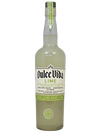 Bottle of Dulce Vida Lime Tequila 750 ML with fresh limes and a cocktail glass