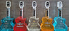 Rock N Roll Tequila Combo 750 ML (5 Bottles) in guitar-shaped bottles, featuring flavors: Añejo Cristalino, Mango, Silver Platinum, Strawberry, and Double Distilled Blue Agave.